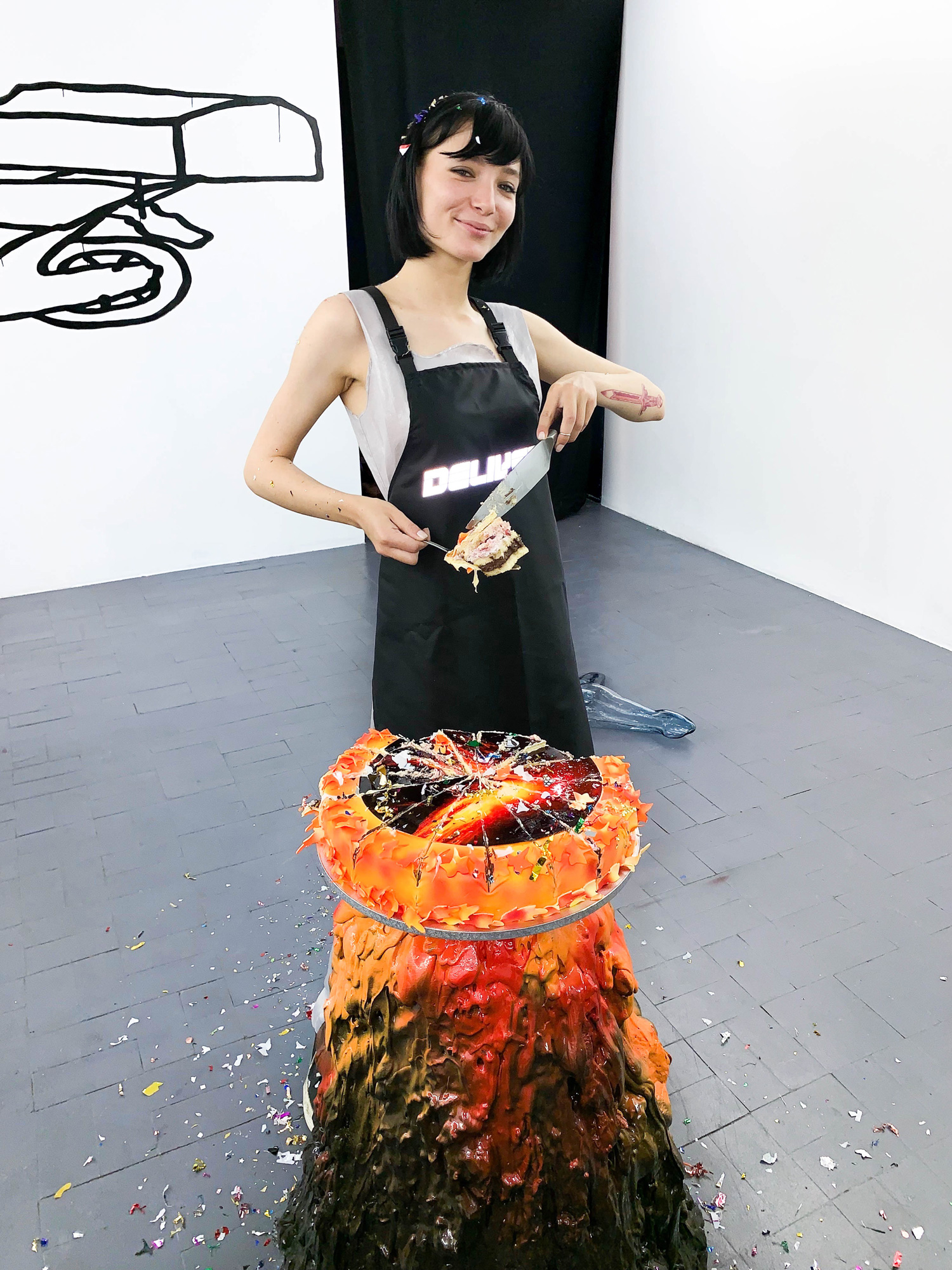 Volcano + Cake = Lava (2019) concrete and acrylic, print on cake, “Delivery” at CAV Multimedia gallery in Bucharest, 2019, Ştefan Tănase